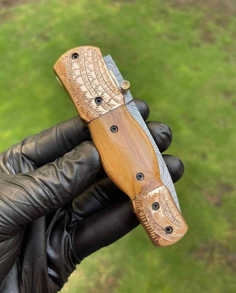 Damascus Blade EDC folding pocket knife by cskforged showing the open knife with Damascus steel blade and textured handle.