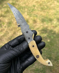 Damascus Blade EDC folding pocket knife by cskforged, featuring a patterned Damascus steel blade and ergonomic handle.