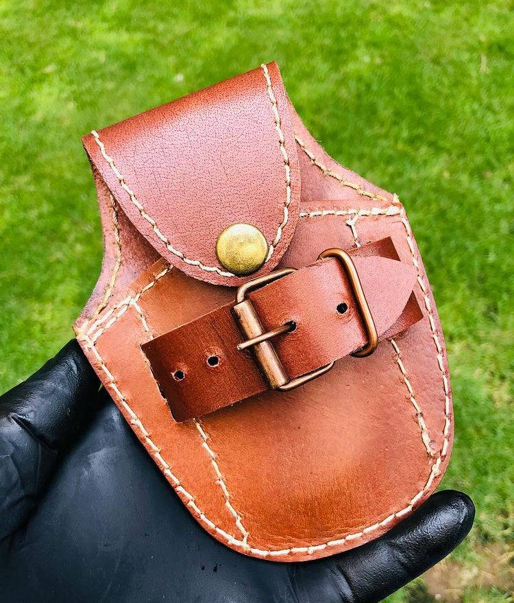 Damascus folding pocket knife by cskforged with a foldable blade, compact EDC design, and intricate Damascus steel pattern.