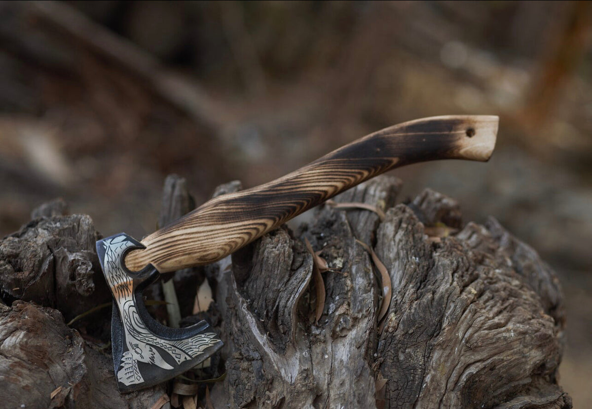 Custom handmade engraved Viking axe with D2 steel blade and ash wood handle, includes leather sheath, by Knives Gear Garage.