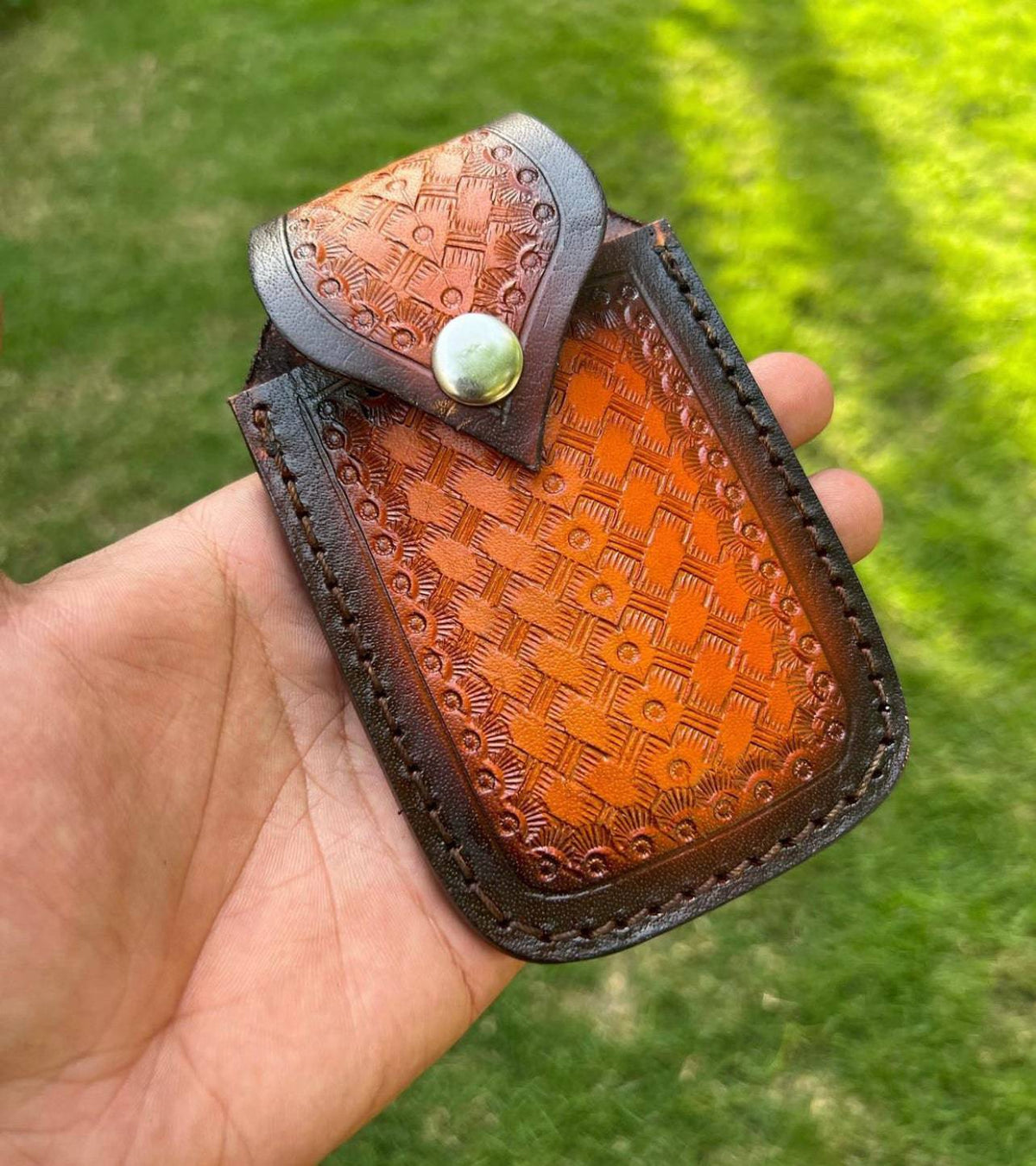 Handmade Damascus steel Tanto blade folding pocket knife by cskforged, featuring a sleek EDC design and textured handle.