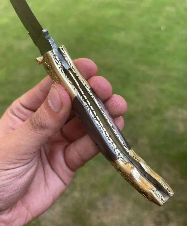 Damascus Blade EDC pocket knife by cskforged with a patterned Damascus steel blade and a sleek handle for everyday carry.