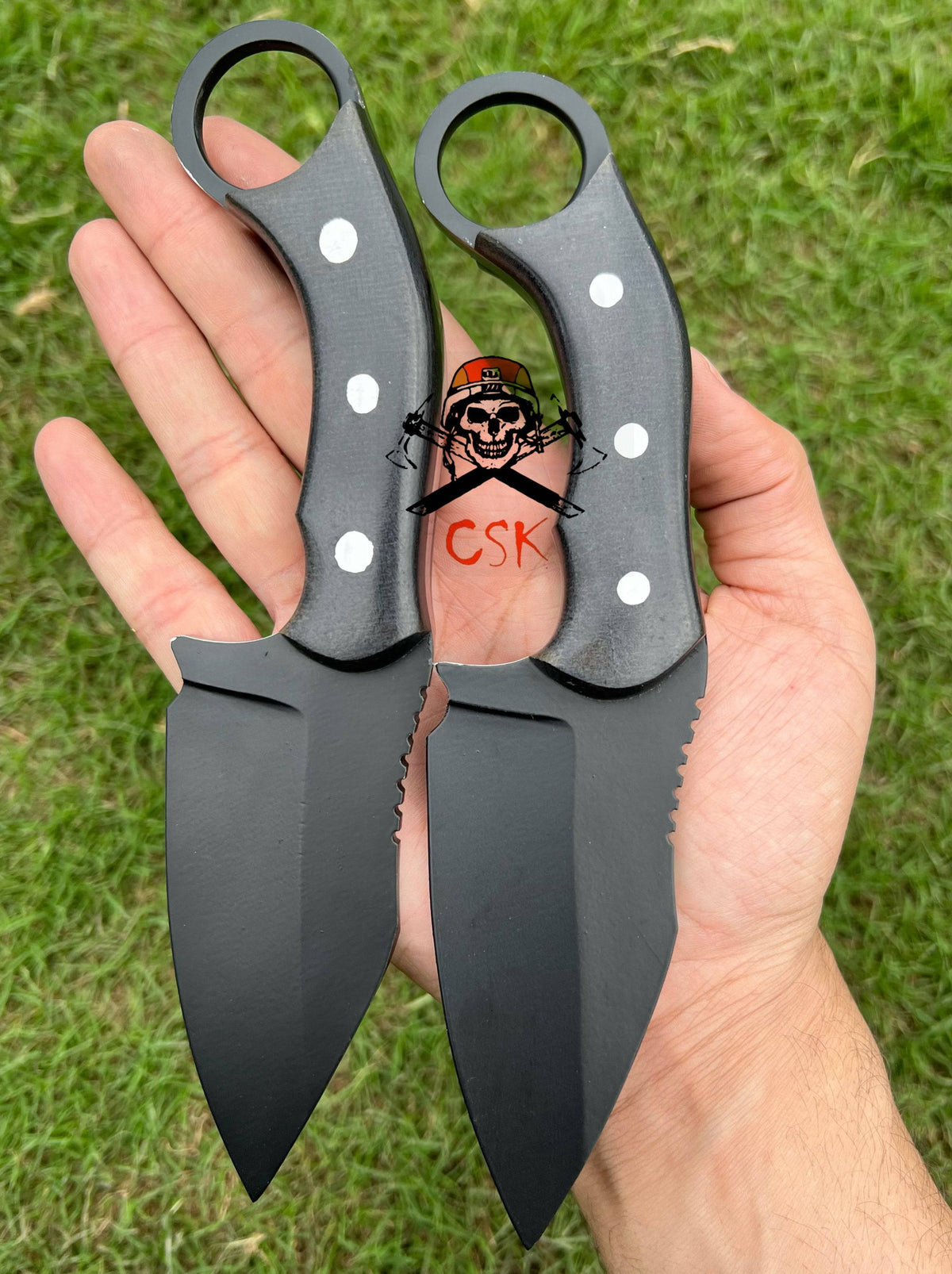 Skinning knife with fixed blade, black coated D2 steel, from cskforged's ring-tail EDC set, showcasing the durable, sharp blade.