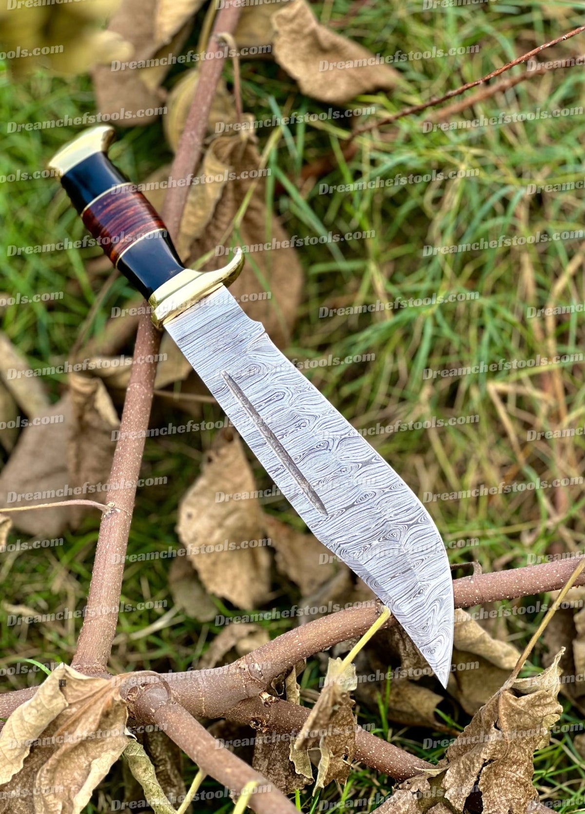 Handmade Damascus Steel Crocodile Dundee Bowie Knife with buffalo horn handle, brass guard, leather sheath, from Knives Gear Garage.