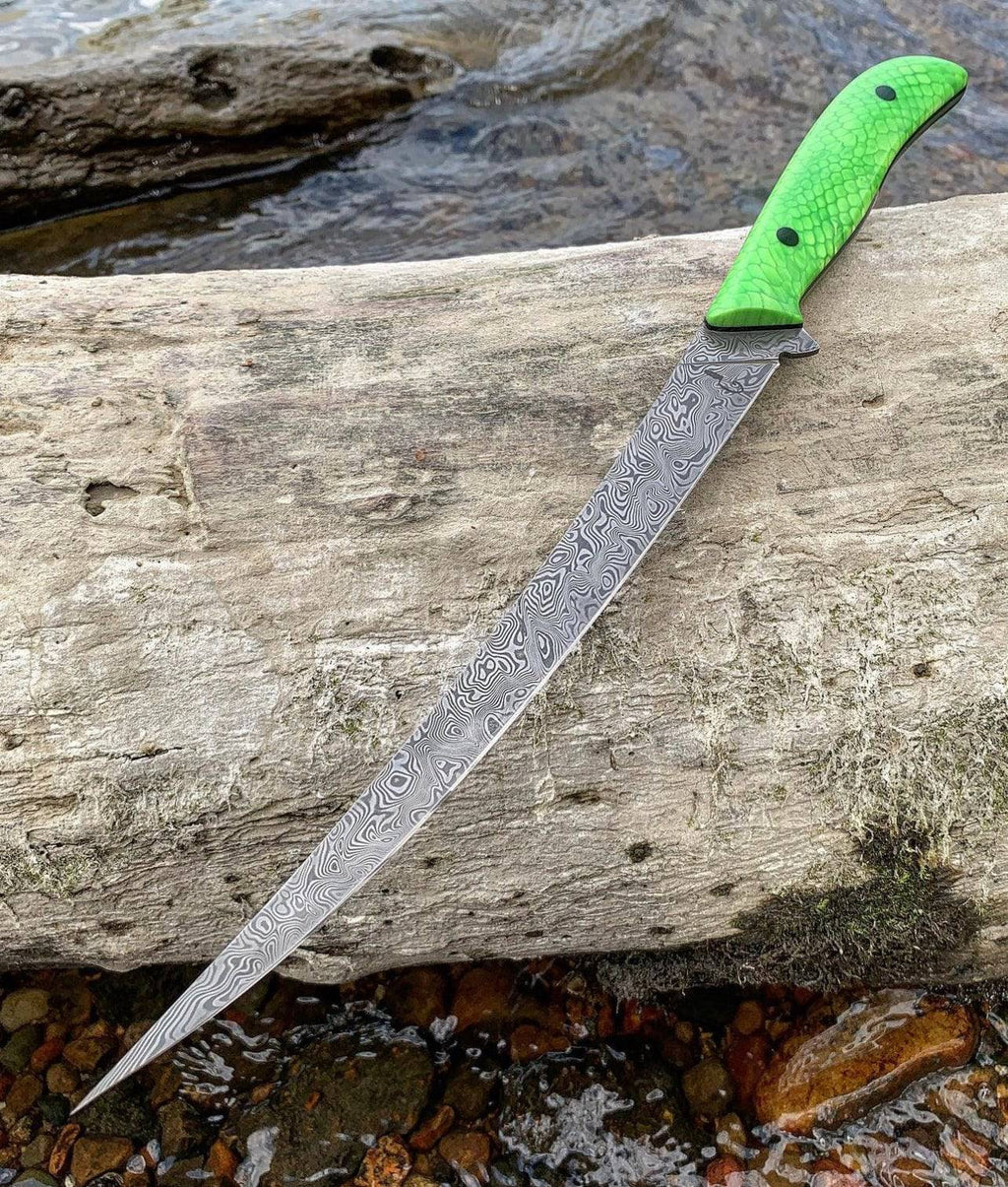 Fixed blade Damascus steel fillet knife by cskforged, featuring a sharp, curved blade ideal for fish filleting.