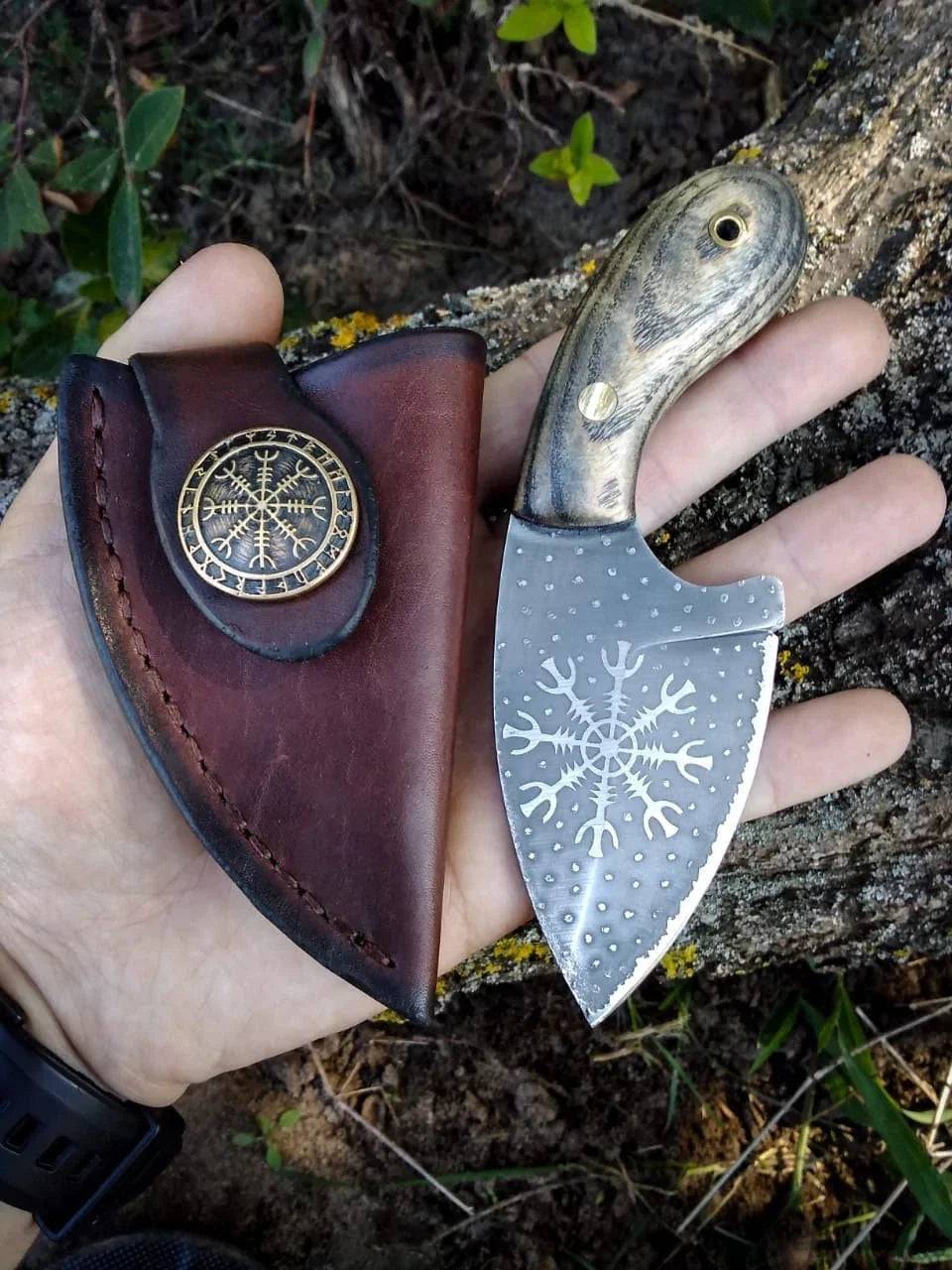 Handmade Viking fixed blade skinning knife by cskforged with a sharp, durable blade and wooden handle for outdoor hunting and skinning.