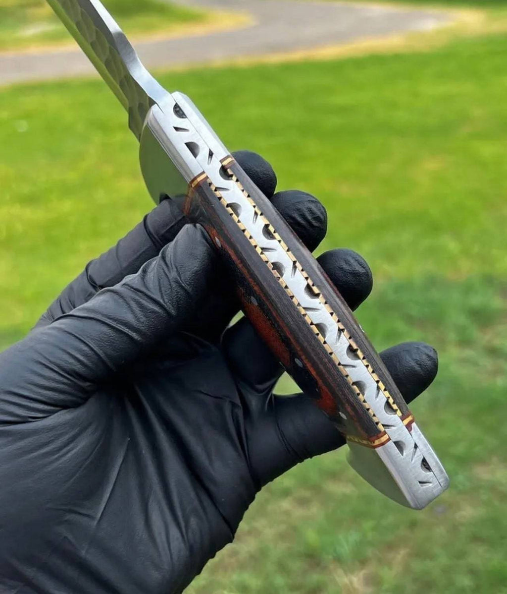 Fixed blade camping knife by cskforged, hand forged D2 steel with a durable handle, ideal for outdoor and camping use.