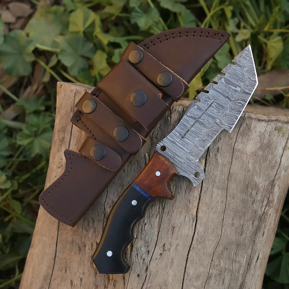 Tracker camping knife by Knives Gear Garage with a stainless steel blade and ergonomic handle, ideal for outdoor survival and camping.