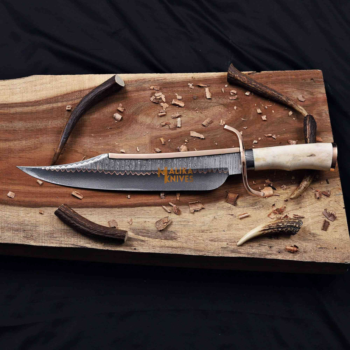 Full view of Malika Knives Copper Damascus Alamo Musso Bowie Knife with a traditional Jim Bowie-style blade and intricate pattern.