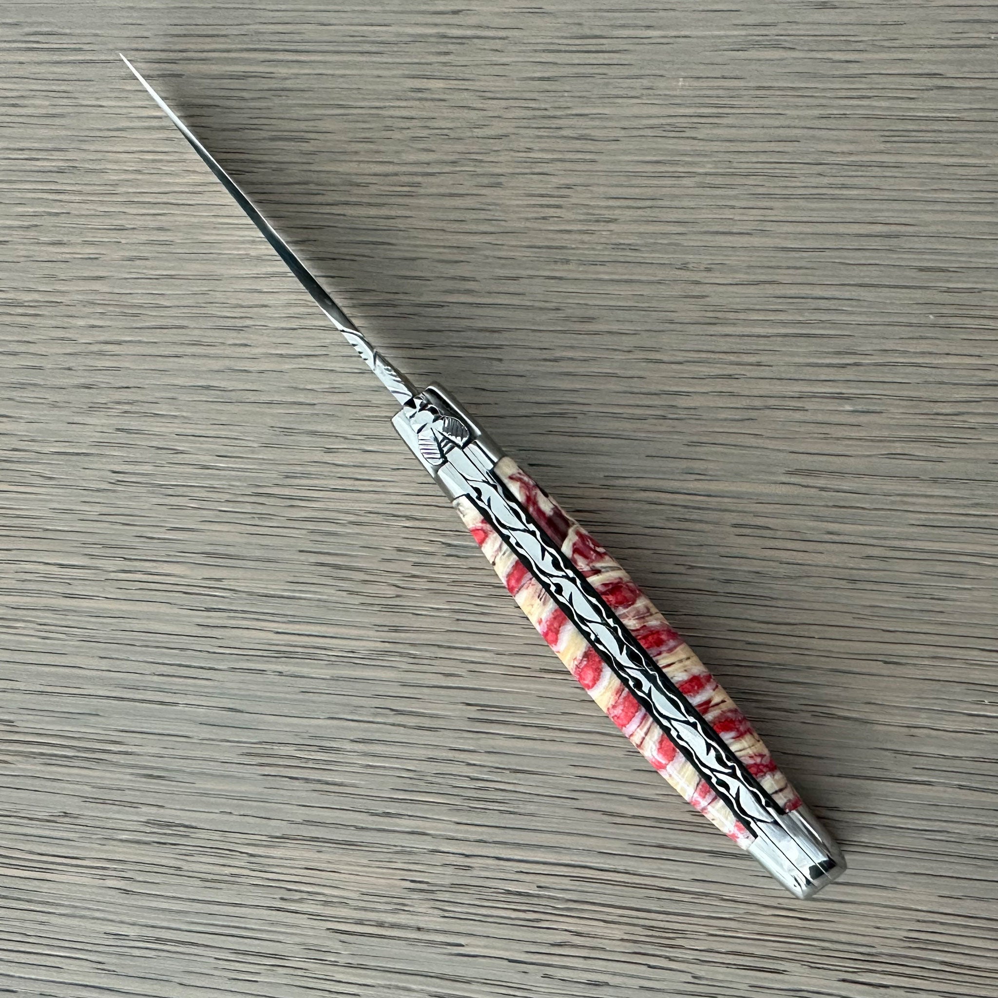 Laguiole en Aubrac Handcarved Plates Multipurpose Knife, Red Mollar Handle, 4.75 inches