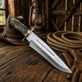 Muela Magnum Bowie Knife by SHAM KNIVES with stag antler handle and sheath, featuring a Damascus blade for outdoor or hunting use.
