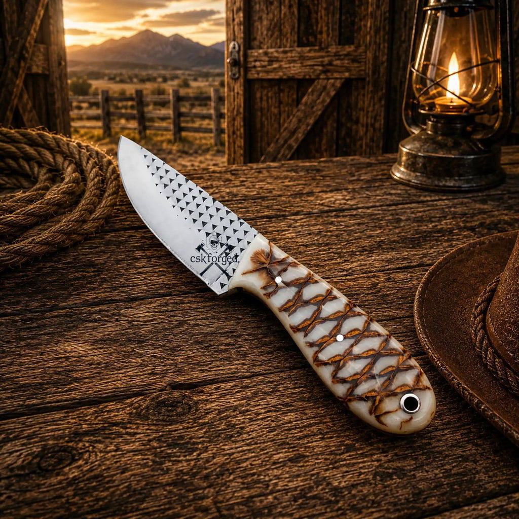 CSK Forged cowboy knife with epoxy resin handle and rasp file design, ideal for ranch and outdoor use.