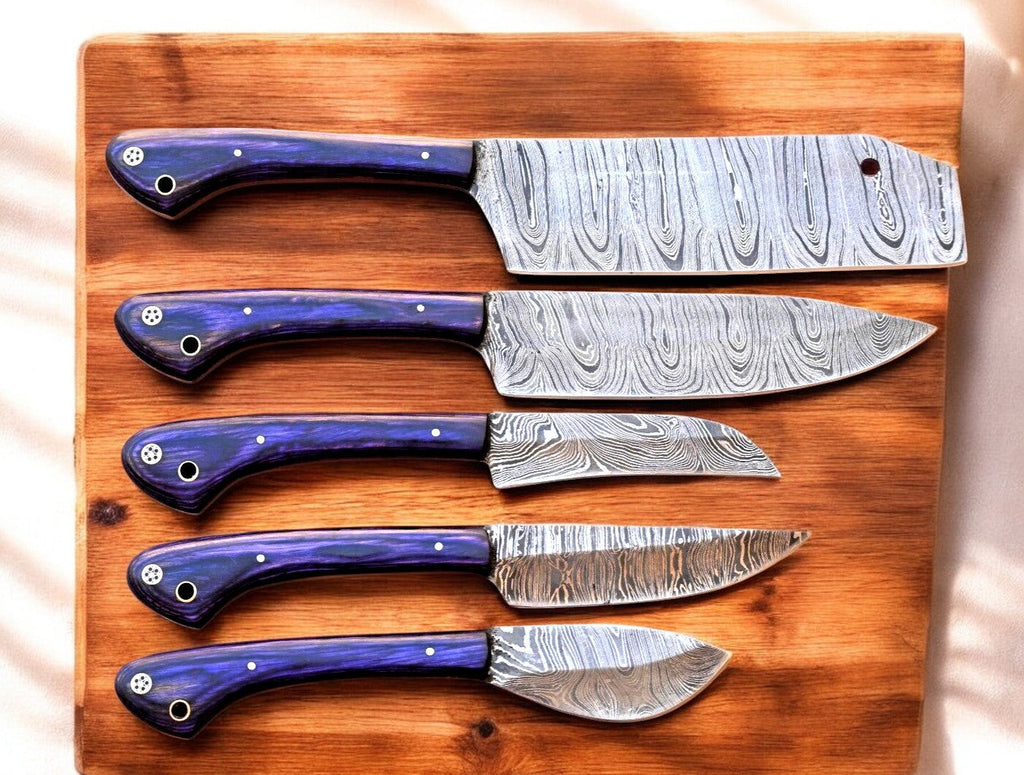 Handmade Damascus kitchen knives set with exotic wood handles, featuring polished blades and ergonomic grips.