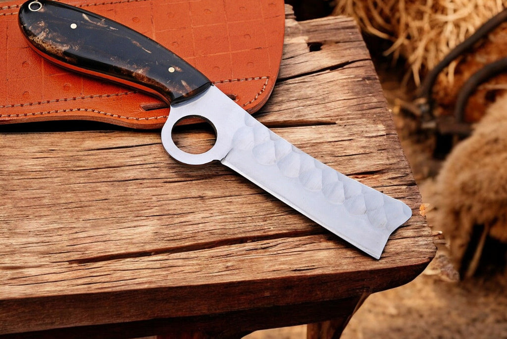 Custom handmade bull cutter knife with an exotic wood handle, crafted by Damascus Knife Store, featuring a sharp stainless steel blade.