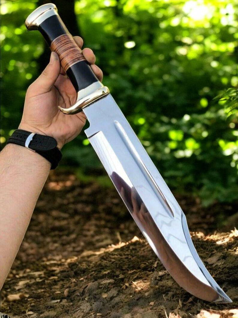 Custom handmade Bowie knife with a 17-inch blade and buffalo horn handle from Damascus Knife Store, detailed close-up of the blade and handle