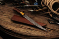 Damascus Knife Store premium 12.5-inch handmade Damascus fillet knife with a polished blade and ergonomic handle.