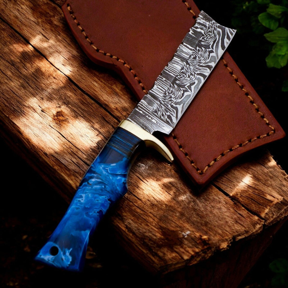 Handmade Damascus Steel Bull Cutter Knife with an 8-inch blade from Damascus Knife Store, showcasing intricate steel patterns and craftsmanship.