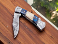 Damascus Knife Store EDC utility knife with bone and resin handle, featuring a sleek, compact design for everyday carry and versatile use.
