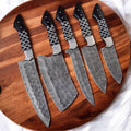 Premium Damascus kitchen knives set with epoxy resin handles, showcasing sleek blades and ergonomic handles for precise cutting.
