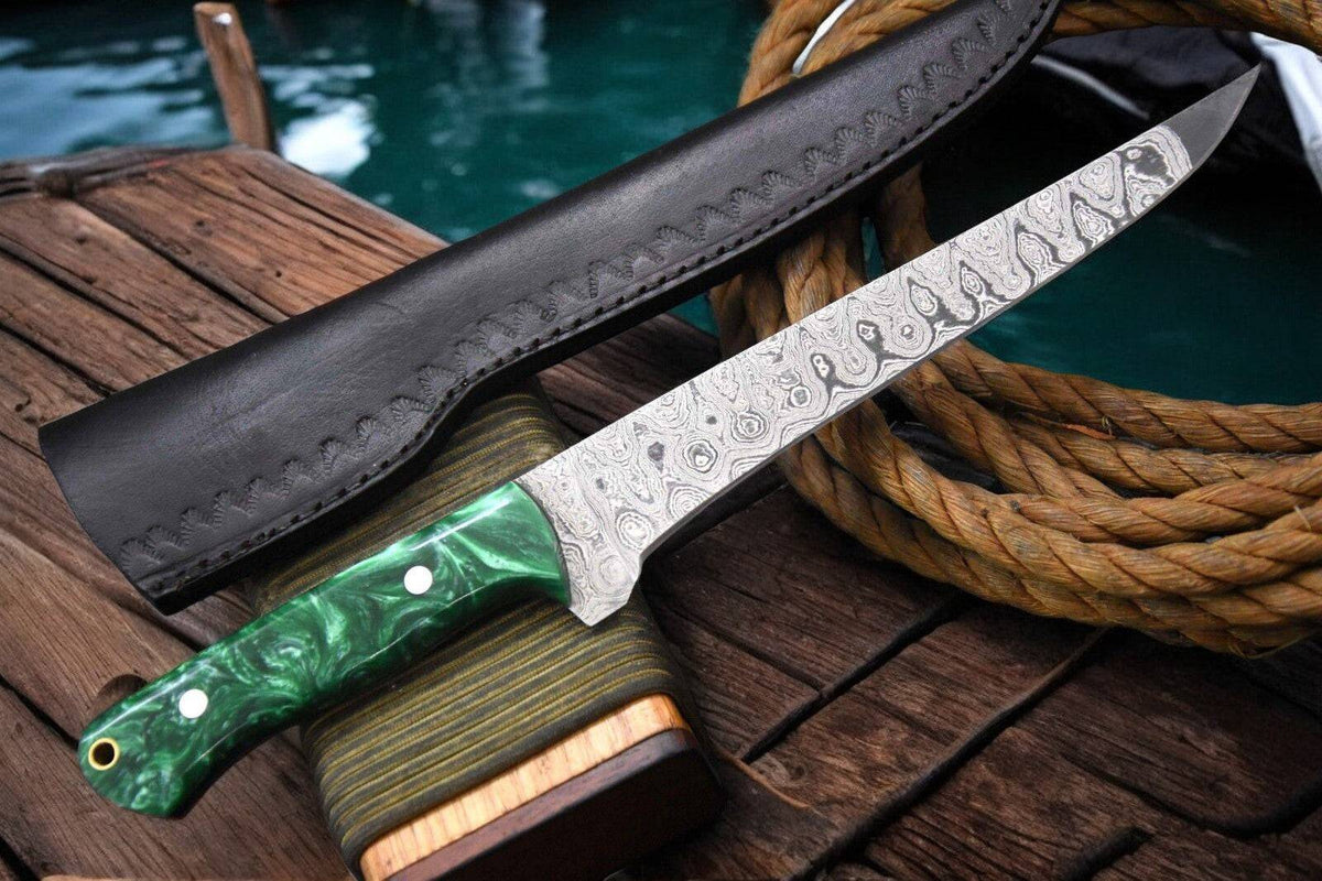 Handmade 12.8-inch Damascus fillet knife with a sleek stainless steel blade and ergonomic handle for precision filleting.