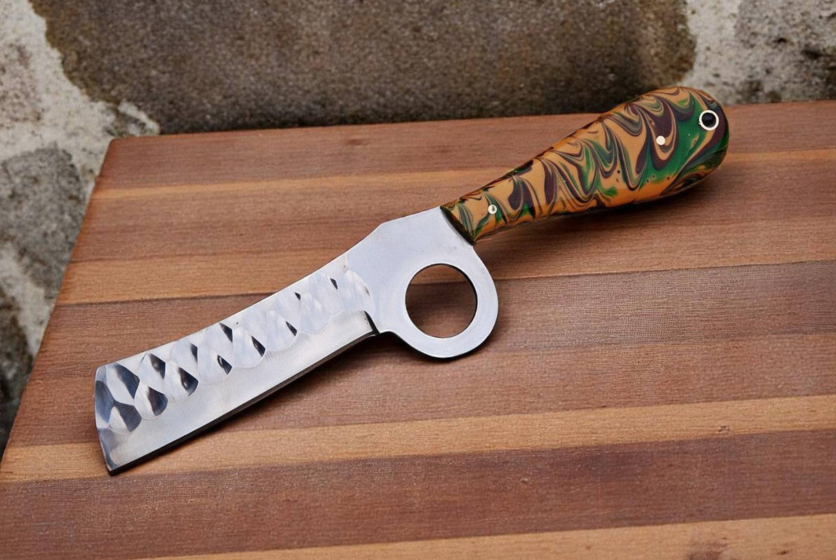 Custom handmade bull cutter knife with resin handle, featuring a Damascus Knife Store logo on the blade, detailed craftsmanship.