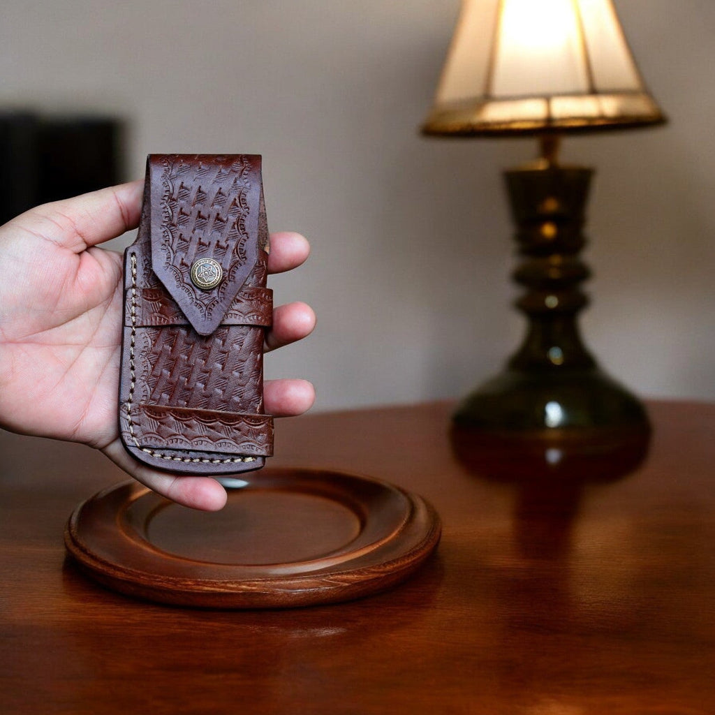 Handmade Damascus Wood pocket knife with a sharp blade and intricate wood handle, displayed on a neutral background.