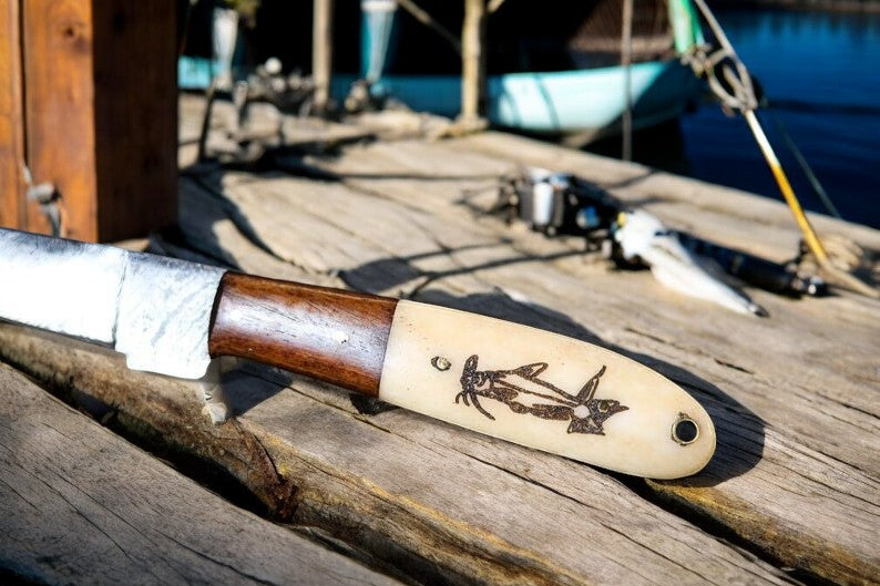 Custom handmade Damascus fillet knife with 13-inch blade, featuring a bone and wood handle, crafted by Damascus Knife Store.
