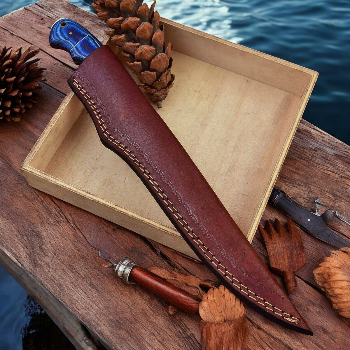 Custom handmade Damascus fillet knife with a 12-inch blade and exotic wood handle, featuring intricate Damascus steel pattern.