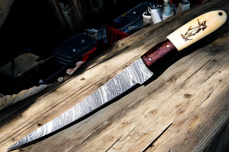 Custom handmade Damascus fillet knife with 13-inch blade, featuring a bone and wood handle, crafted by Damascus Knife Store.