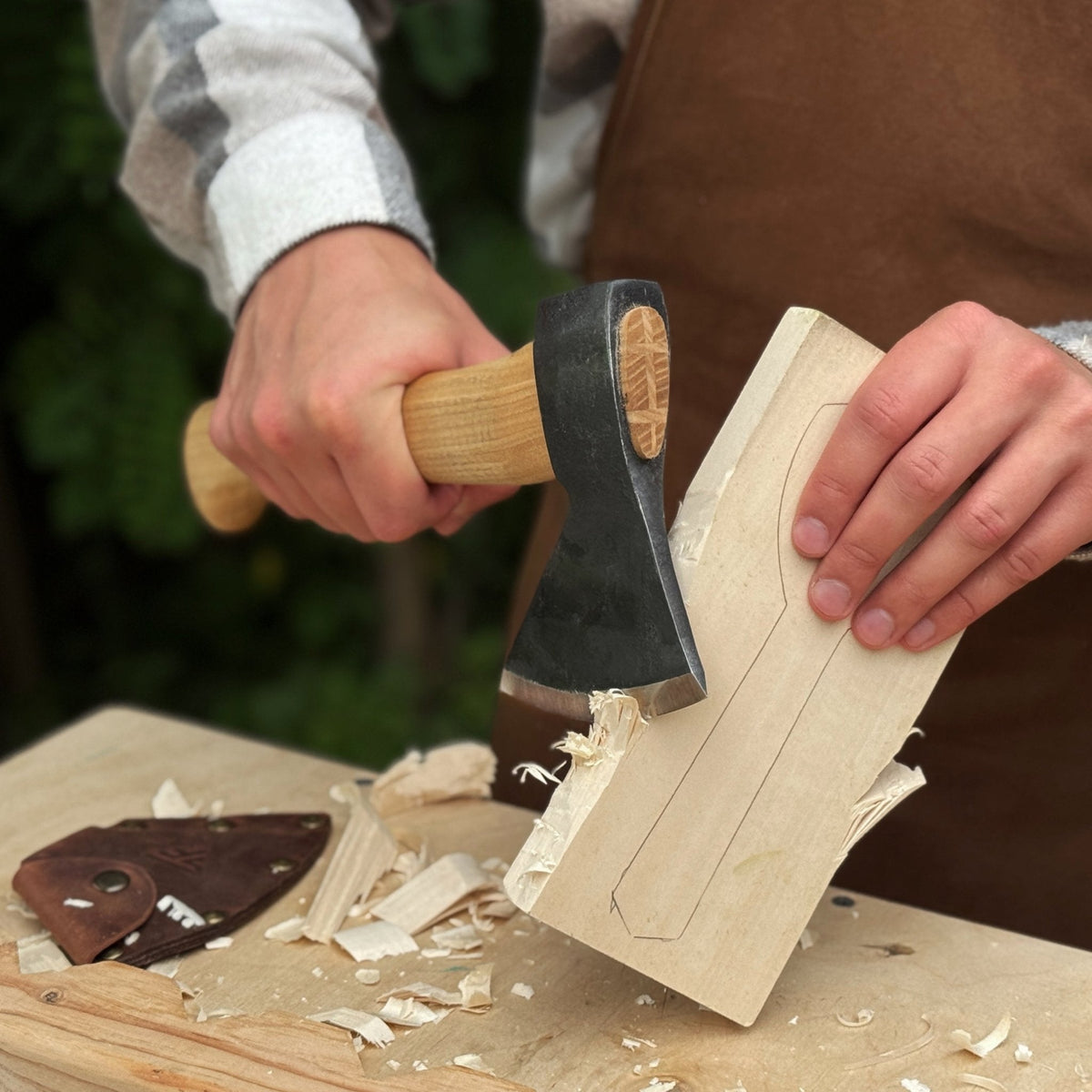 Small Carving Axe by Sharky Forged Steel Tools being used on wood - Relic & Reel