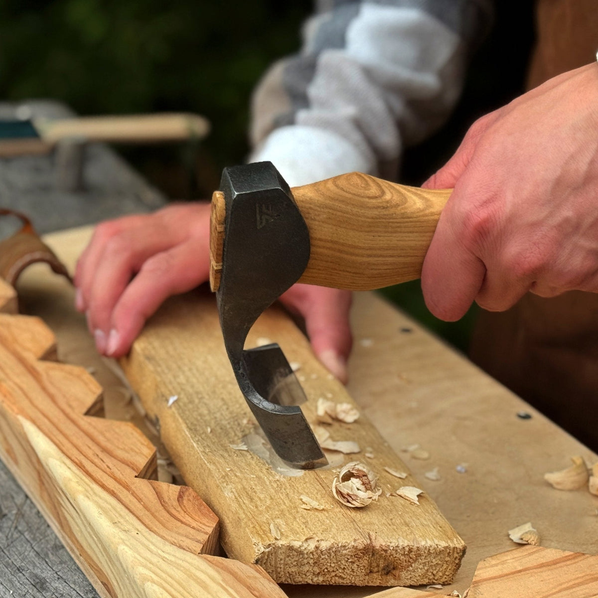 Small Kuksa adze with deep curved round blade by Sharky Forged Steel Tools, 4.5 cm, ideal for woodworking and carving projects.