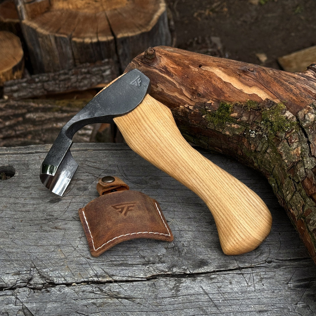 Small Kuksa adze by Sharky Forged Steel Tools with deep curved round blade, 4.5 cm for woodworking or carving projects.