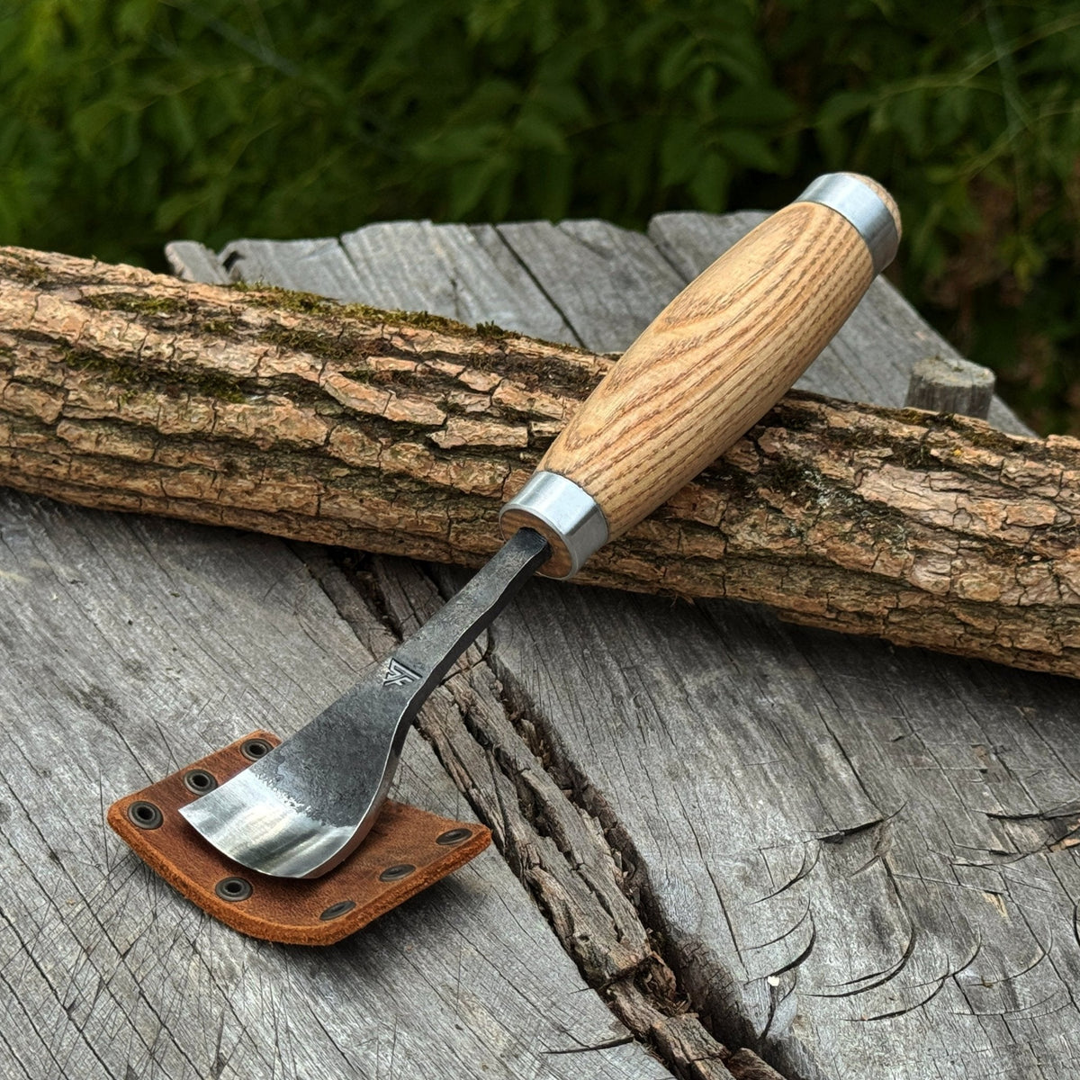 Bent gouge spoon shaped woodworking tool from Sharky Forged Steel Tools, 20-45mm (0.8-1.8 inches) for carving and shaping wood.