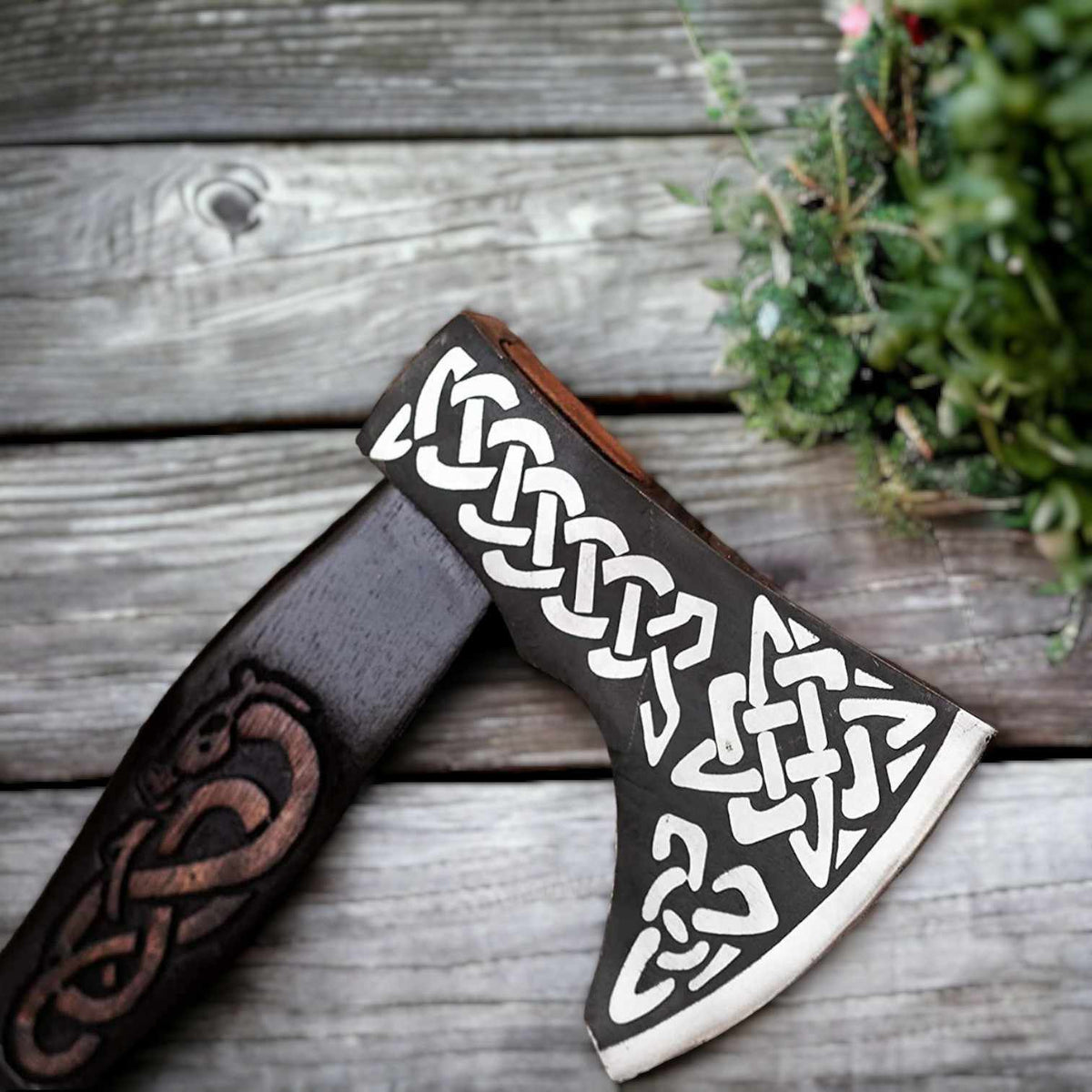 Hand-forged Viking axe head with Celtic knotwork design and carved handle, made from durable carbon steel by MALIKA KNIVES